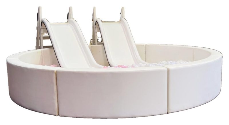 Large white ball pit with two slides